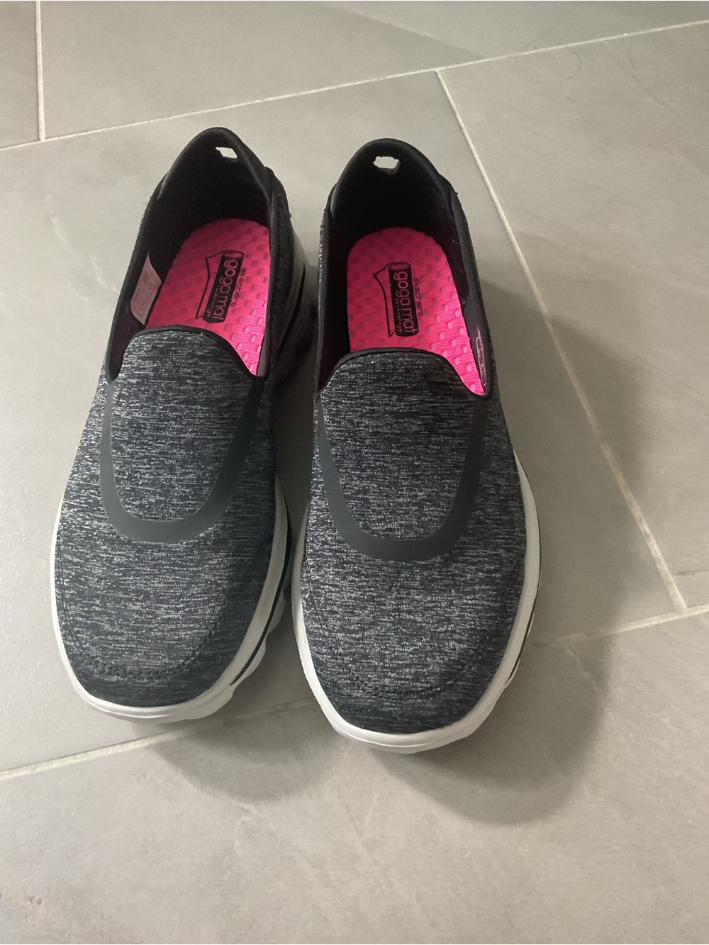 Skechers Slip-On Athletic Sneakers in Black with Pink Insole